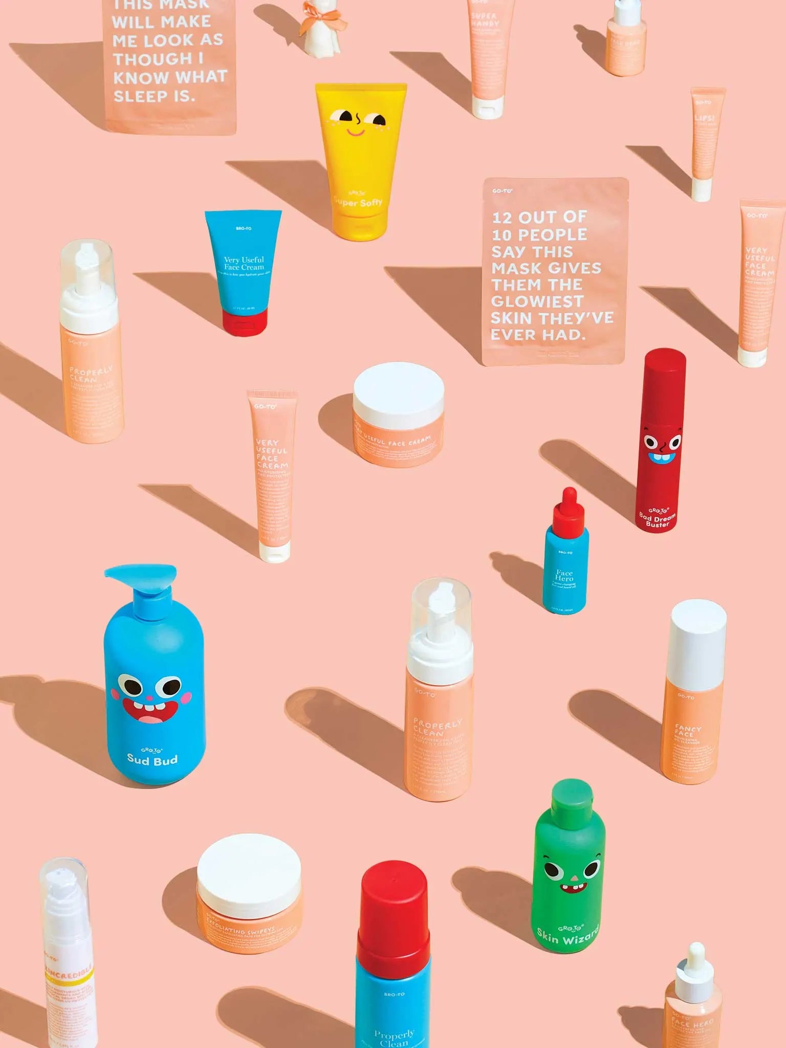 Colorful skincare products with playful, smiling faces are arranged on a peach background. Two signs feature text about the benefits of a mask and how it improves skin and sleep. Shadows fall from the products.